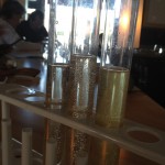 beakers serving wine flights at Wine Lab Costa Mesa.